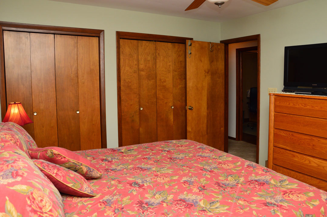 7N201 Stevens Road St. Charles, IL 60175 - Photo 24 of 58 a bedroom with a bed and a flat screen tv