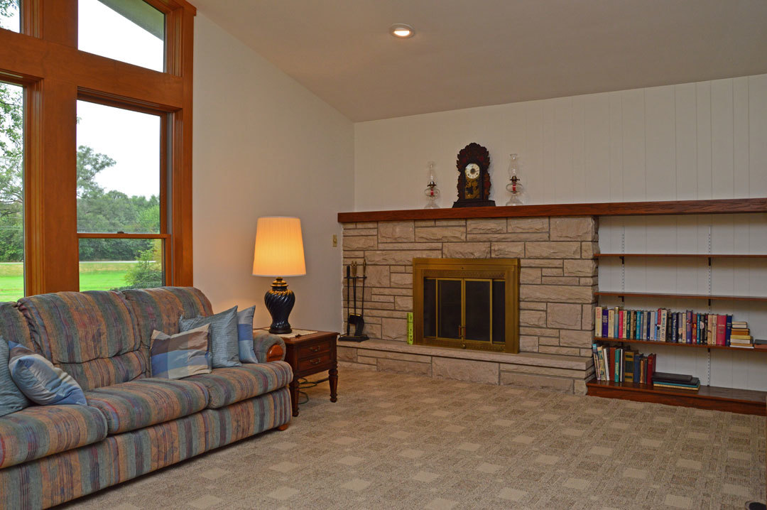 7N201 Stevens Road St. Charles, IL 60175 - Photo 5 of 58 a living room with furniture and a fireplace