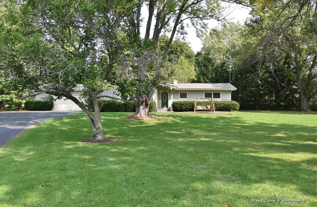7N201 Stevens Road St. Charles, IL 60175 - Photo 48 of 58 a house view with a sitting space and garden