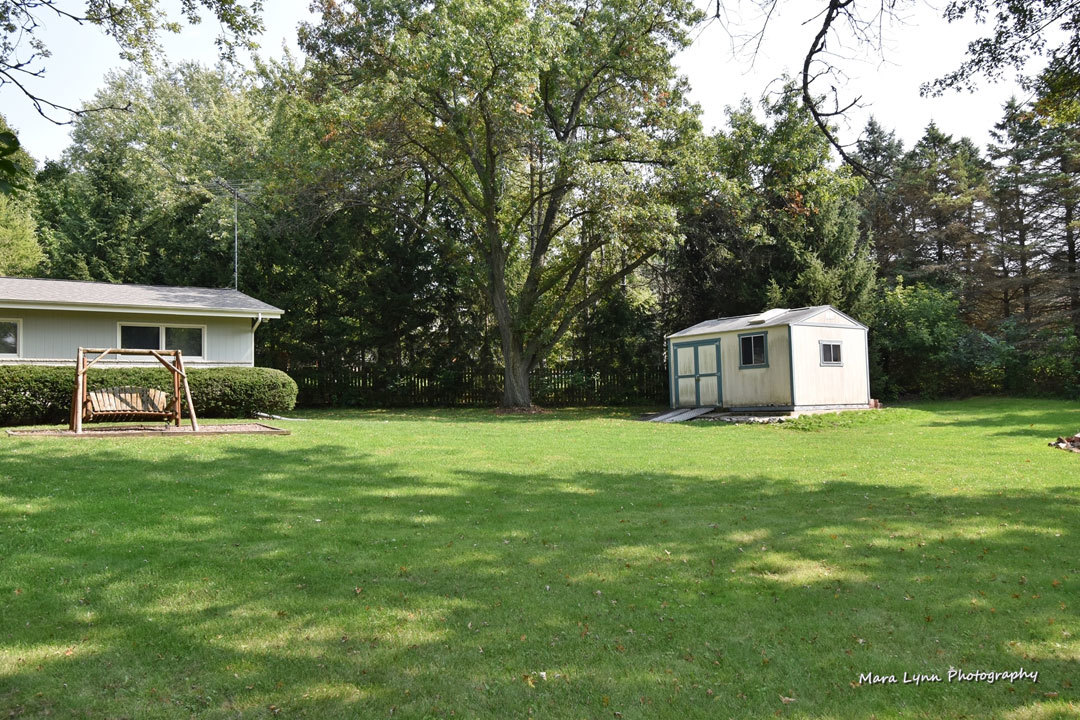 7N201 Stevens Road St. Charles, IL 60175 - Photo 49 of 58 a house view with a sitting space and garden