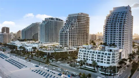 a view of a city with tall buildings