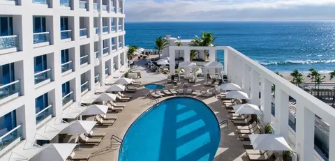 a view of building with outdoor space and seating area