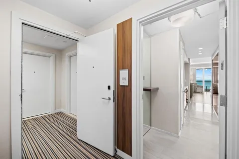 a view of a bathroom from the hallway