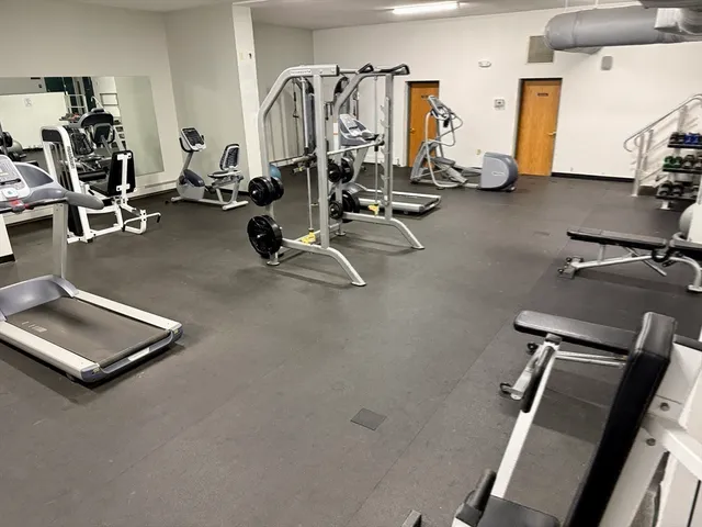 a view of a room with gym equipment