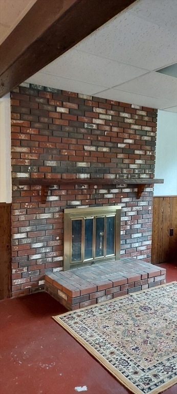 84 T Hall Road Charlton, MA 01507 - Photo 36 of 38 a view of a refrigerator oven and a wooden floor