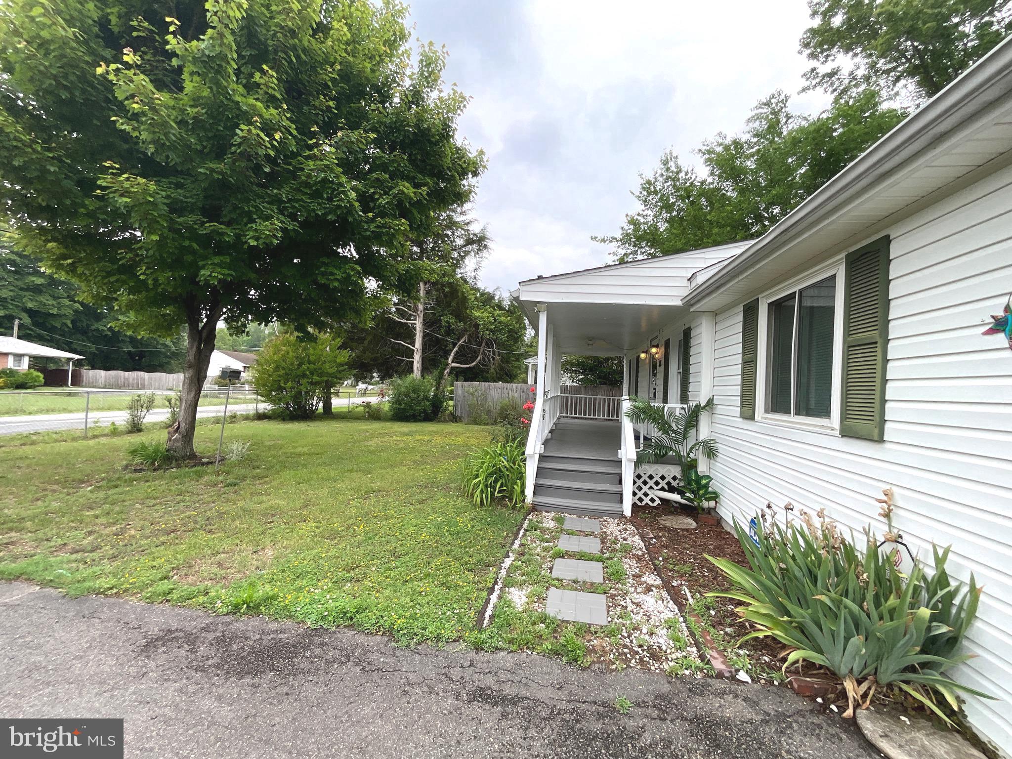 86 Kelley Road Fredericksburg, VA 22405 - Photo 29 of 36 a front view of a house with garden