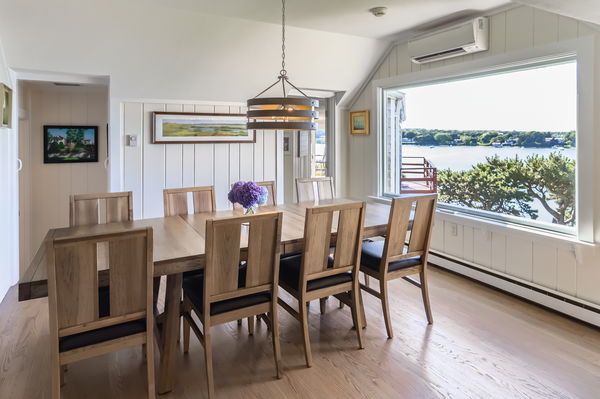217 Barnes Road Oak Bluffs, MA 02557 - Photo 16 of 60 a dining room with furniture window and wooden floor