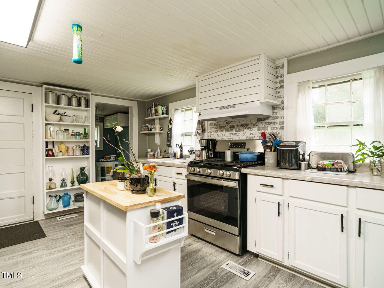 7105 Great Swamp Loop Lucama, NC 27851 - Photo 10 of 28 a kitchen with a stove and cabinets