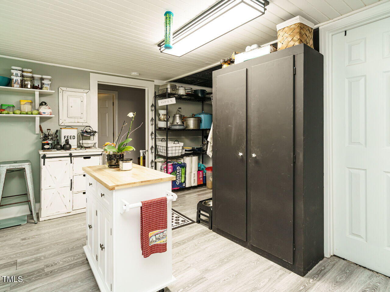 7105 Great Swamp Loop Lucama, NC 27851 - Photo 12 of 28 a kitchen with refrigerator and cabinets