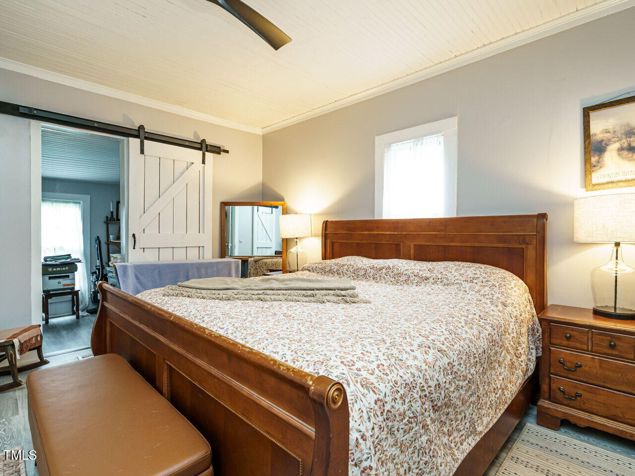 7105 Great Swamp Loop Lucama, NC 27851 - Photo 16 of 28 a bedroom with a bed and window