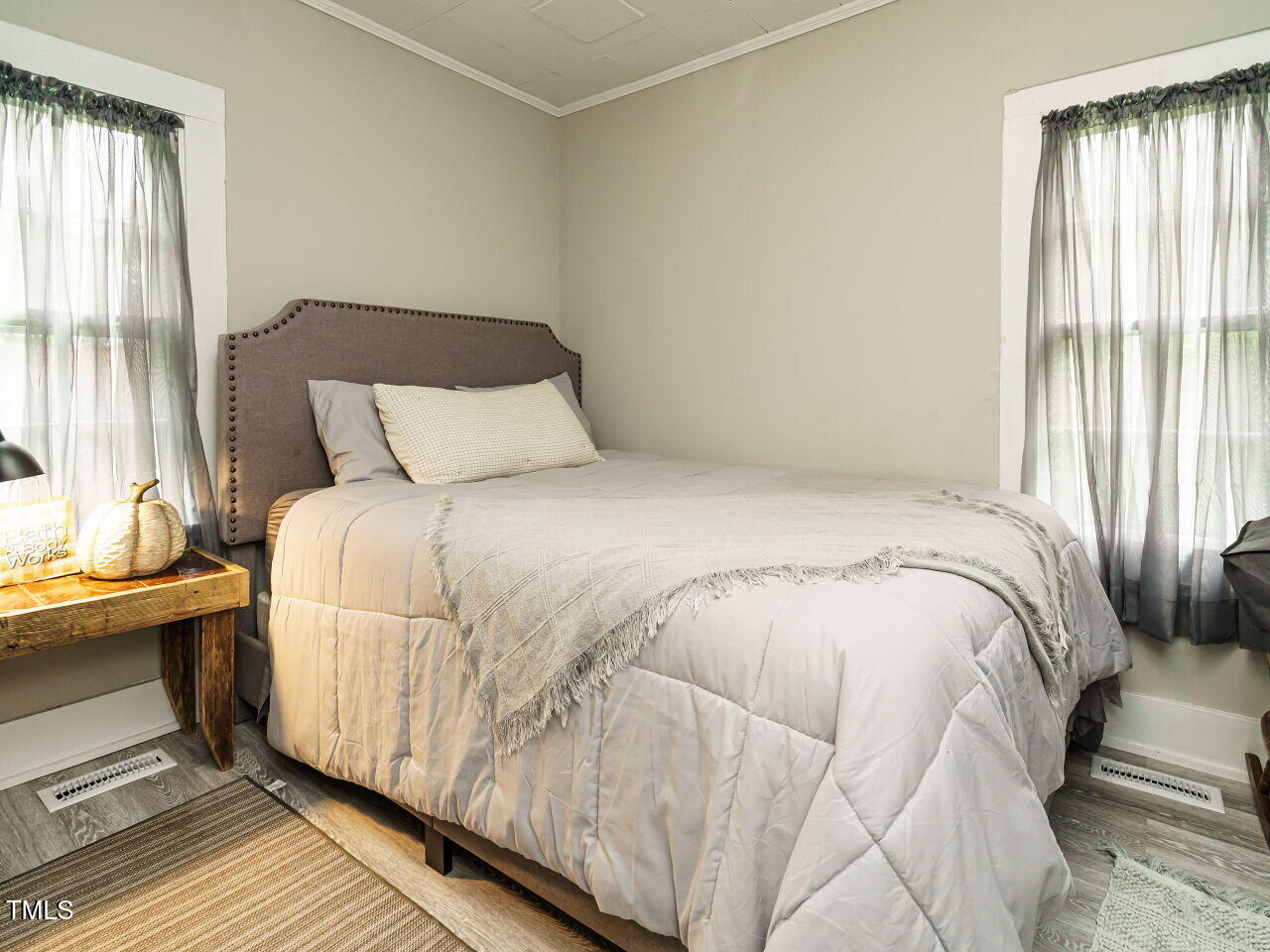 7105 Great Swamp Loop Lucama, NC 27851 - Photo 20 of 28 a bedroom with a bed and a window