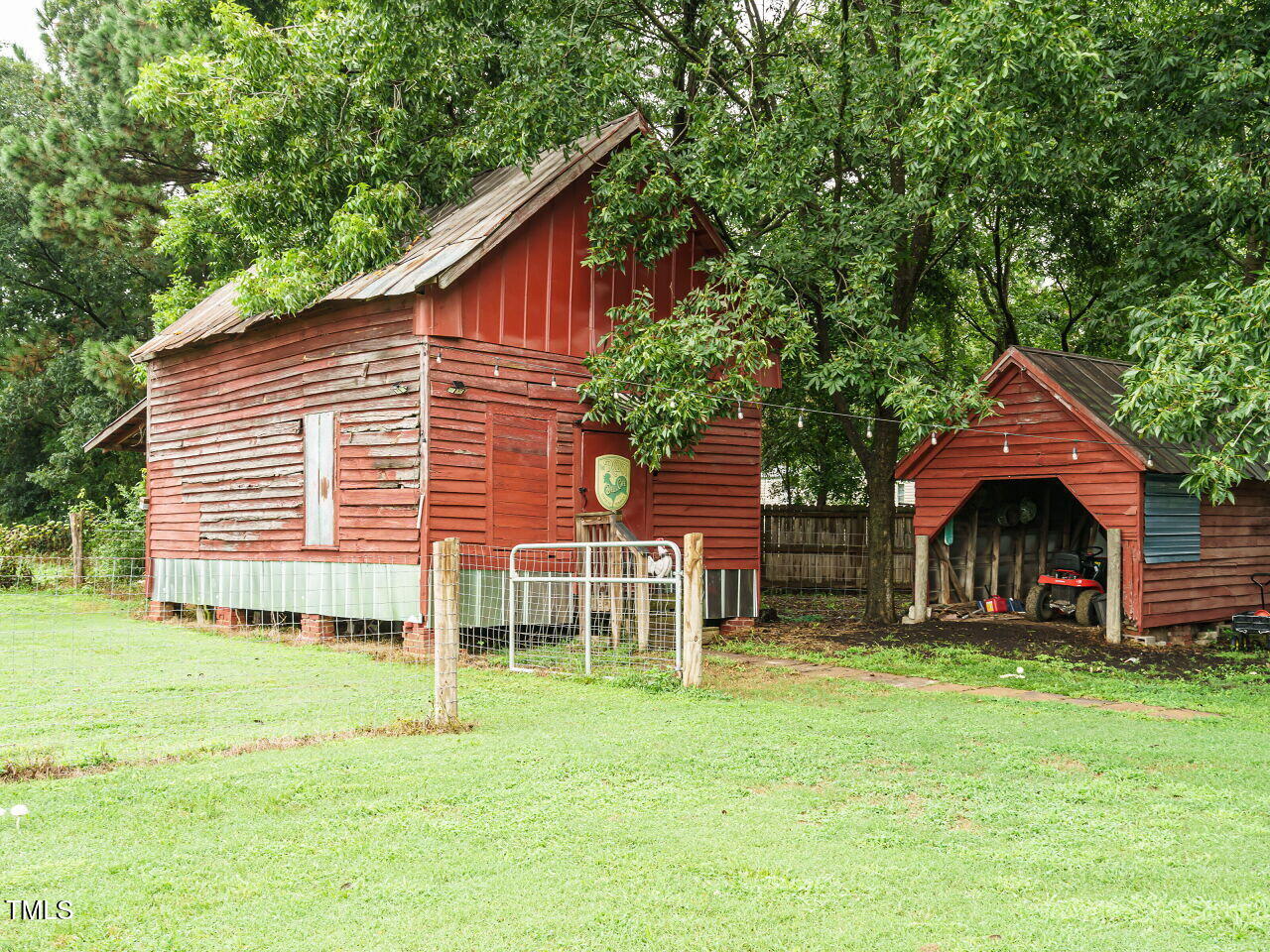 7105 Great Swamp Loop Lucama, NC 27851 - Photo 21 of 28 a view of a house with a yard