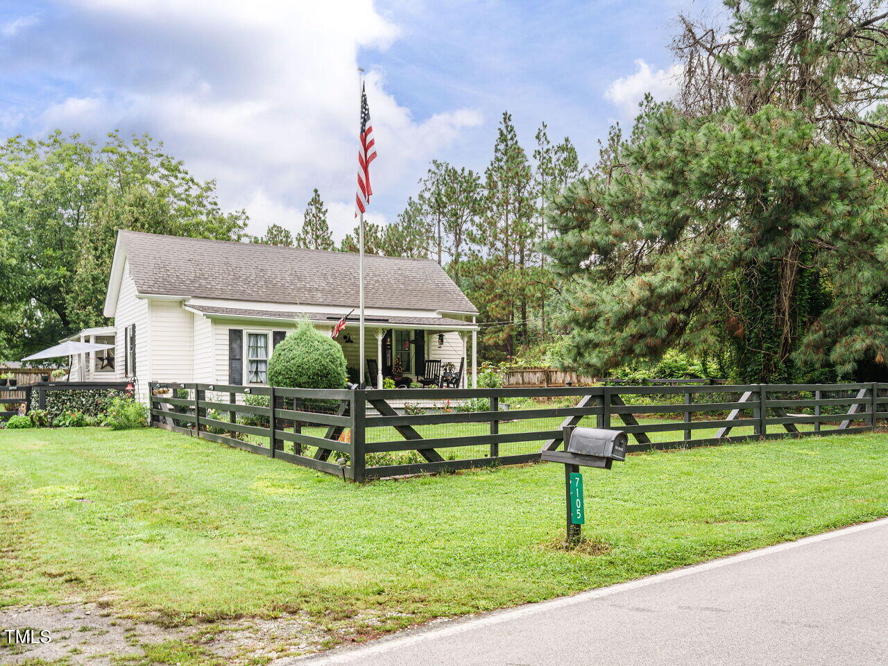 7105 Great Swamp Loop Lucama, NC 27851 - Photo 2 of 28 a view of a house with a yard