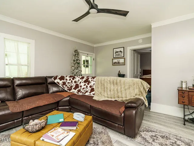 a living room with furniture and a couch