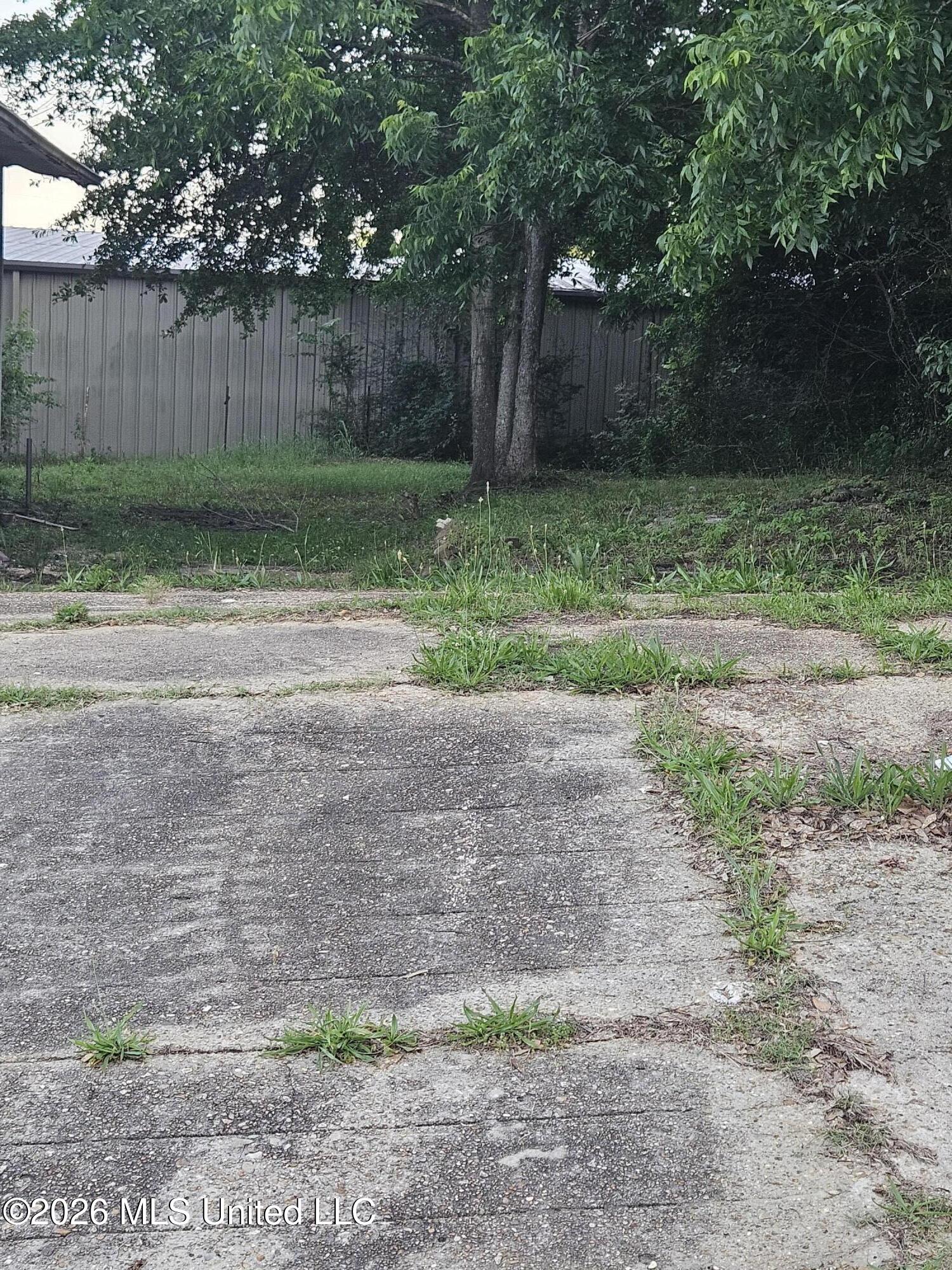 604 South Broadway Street McComb, MS 39648 - Photo 8 of 9 604 Backyard Parking pad