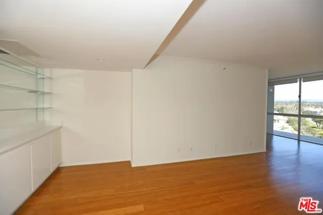 a view of an empty room with window