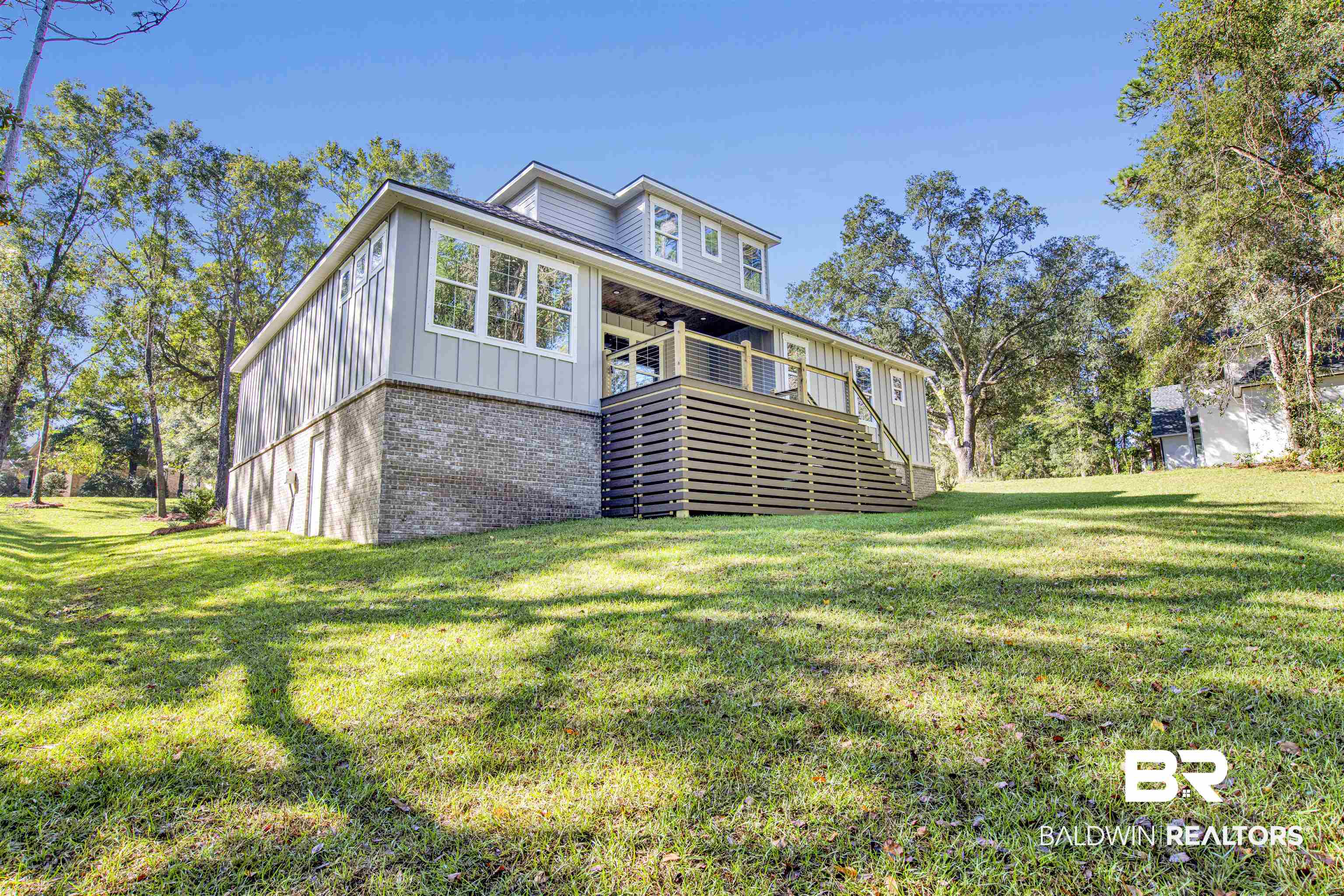 5 Long Leaf Circle Fairhope, AL 36532 - Photo 38 of 44 View of back of house with lawn, basement door