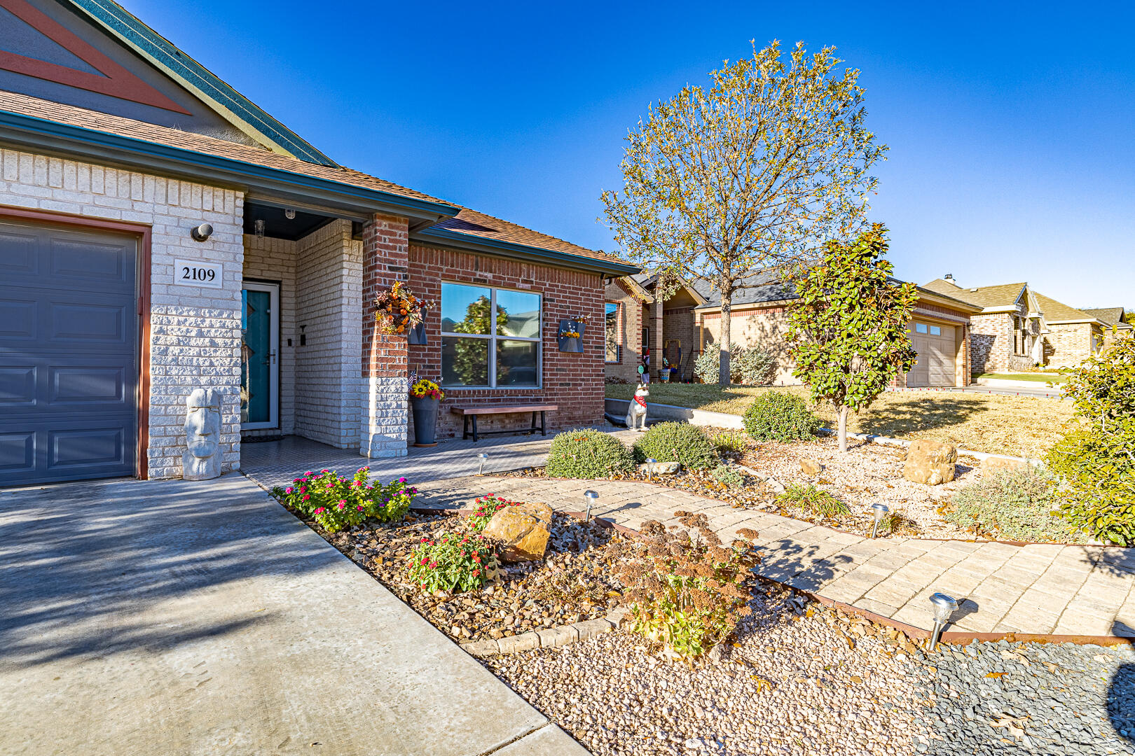 2109 101st Street Lubbock, TX 79423 - Photo 3 of 49 a view of a house with snow on the ground