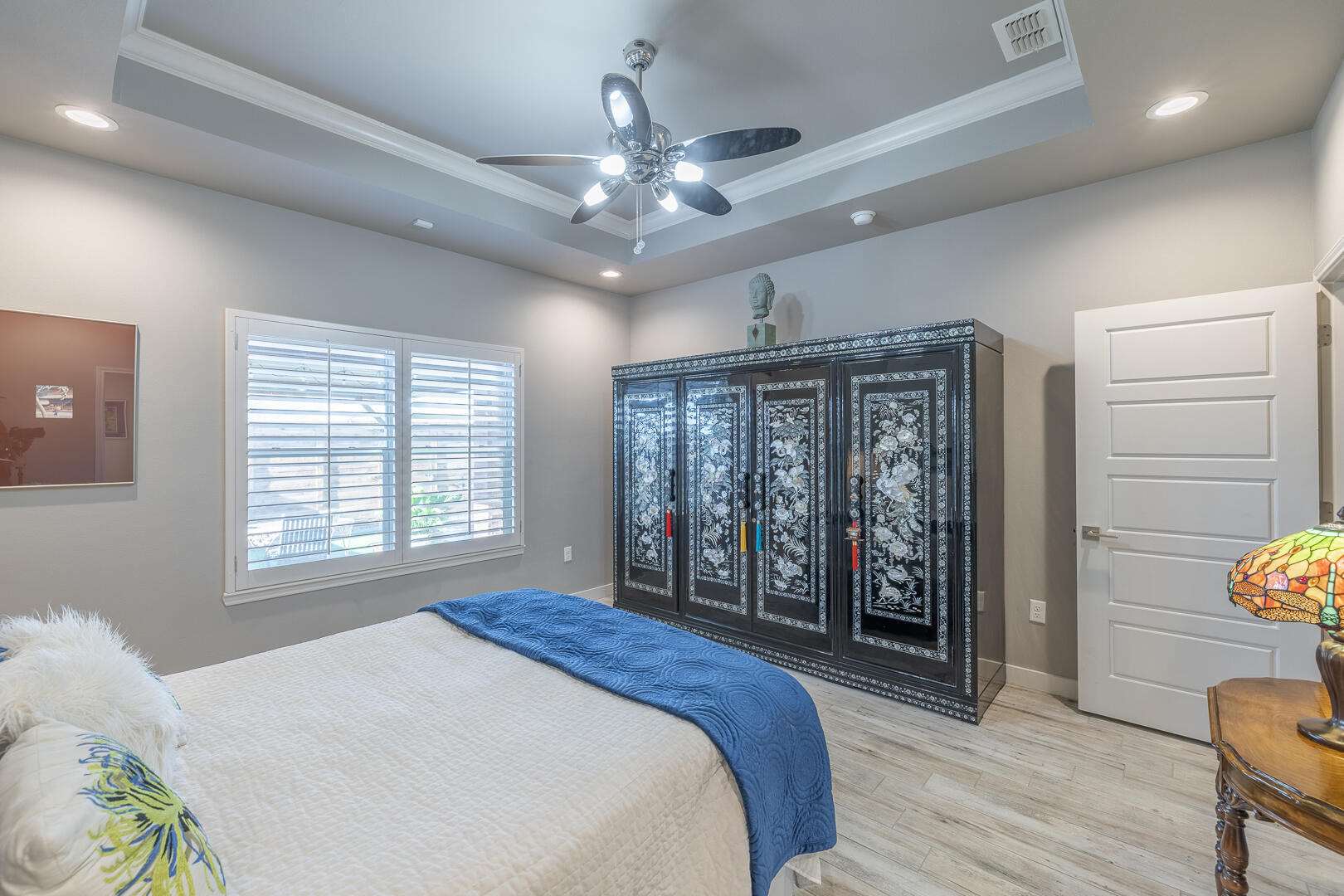 2109 101st Street Lubbock, TX 79423 - Photo 34 of 49 a spacious bedroom with a large bed and a window