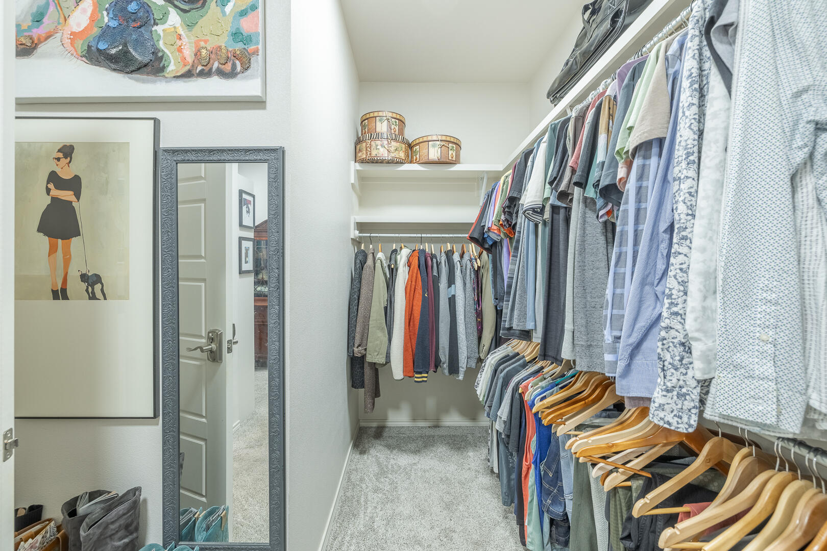 2109 101st Street Lubbock, TX 79423 - Photo 42 of 49 a view of walk in closet with clothes and shoes