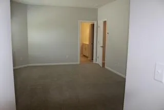 a view of hallway with closet