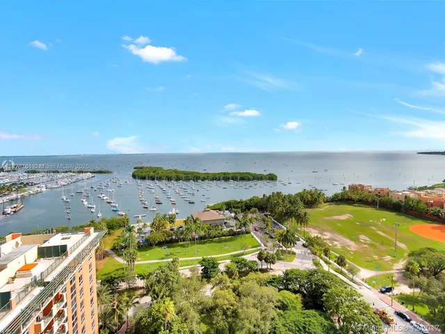 a view of a city with an ocean