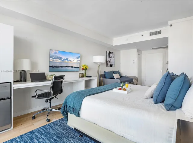 a living room with granite countertop furniture and a couch