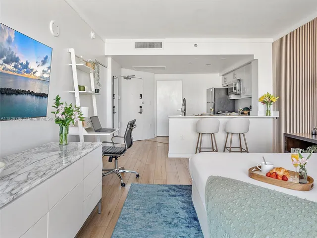 a living room with furniture and a couch