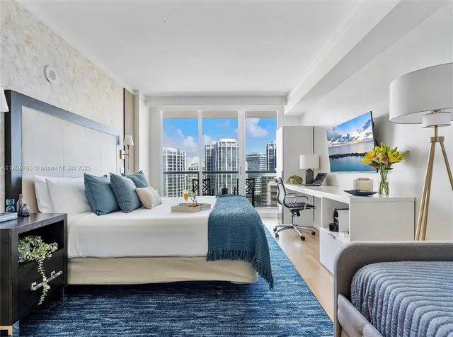 a bathroom with a bathtub and a sink