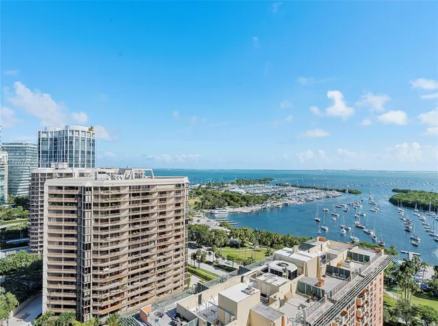 a view of city with tall buildings