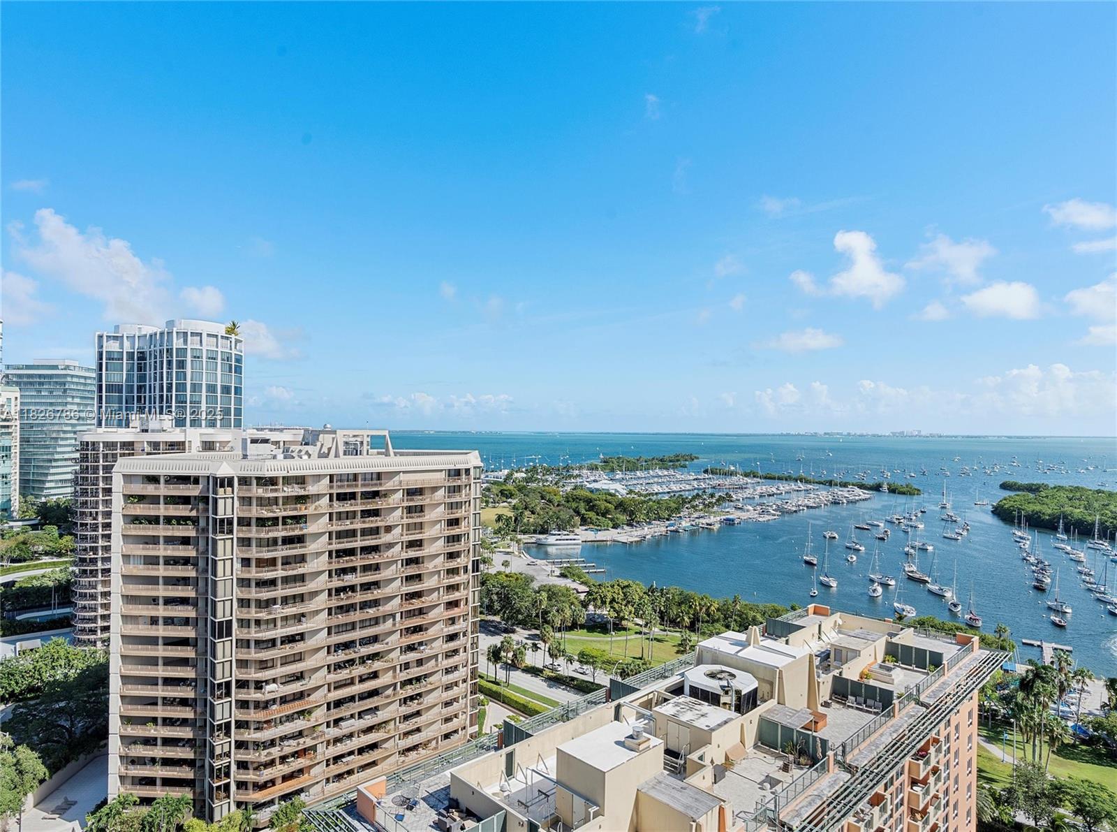 2889 McFarlane Road, Unit 1908 Miami, FL 33133 - Photo 3 of 26 a view of city with tall buildings
