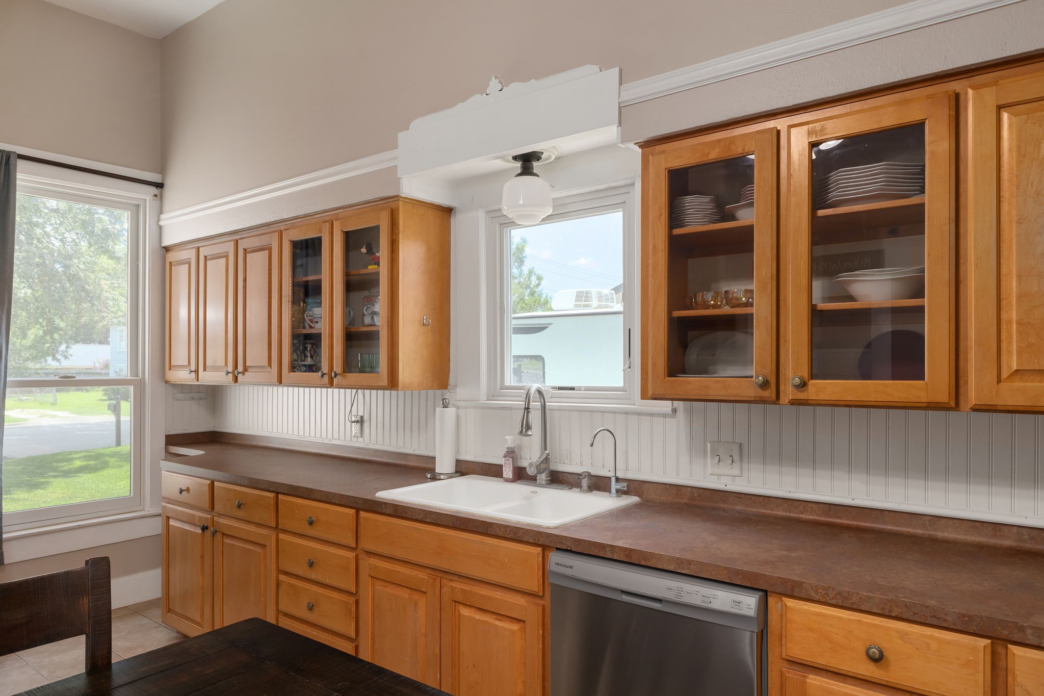 515 Wolf Street Schulenburg, TX 78956 - Photo 13 of 39 a kitchen with a sink and a window