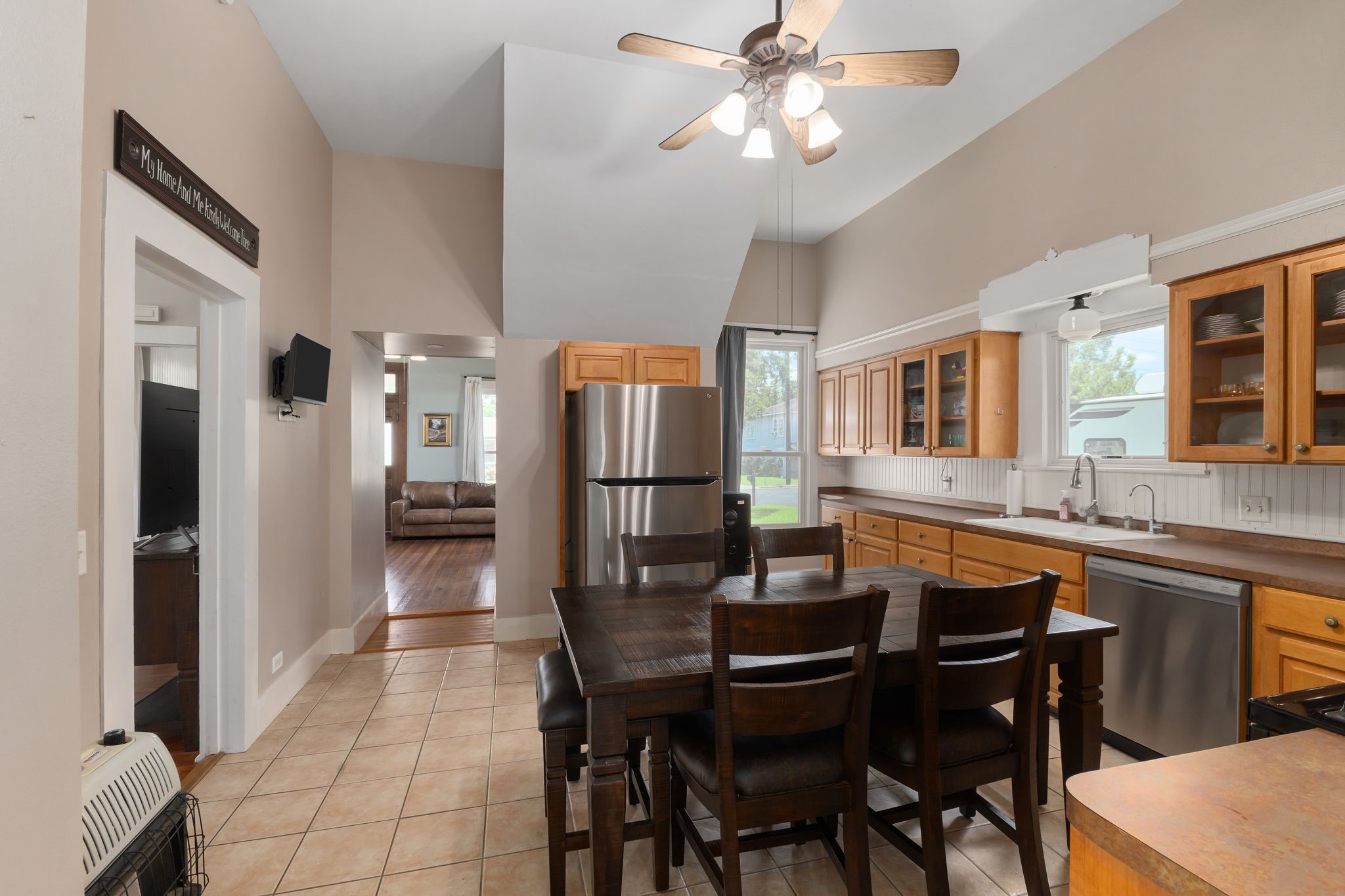 515 Wolf Street Schulenburg, TX 78956 - Photo 14 of 39 a dining room with stainless steel appliances granite countertop a dining table and chairs
