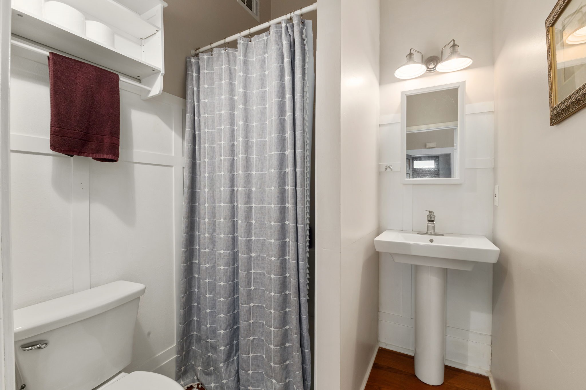 515 Wolf Street Schulenburg, TX 78956 - Photo 21 of 39 a bathroom with a sink a toilet and shower