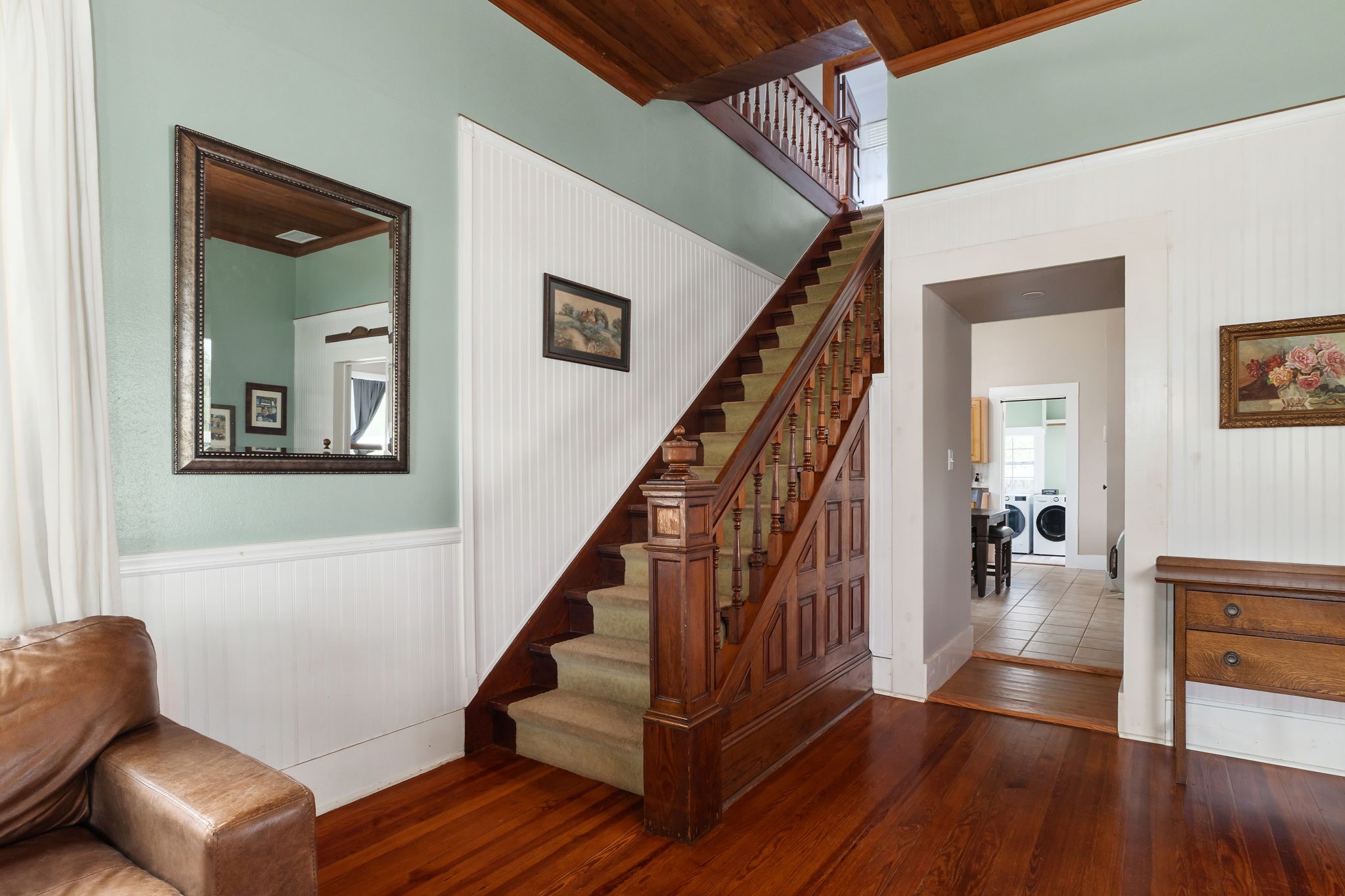 515 Wolf Street Schulenburg, TX 78956 - Photo 22 of 39 a dinning room with wooden floor and stairs