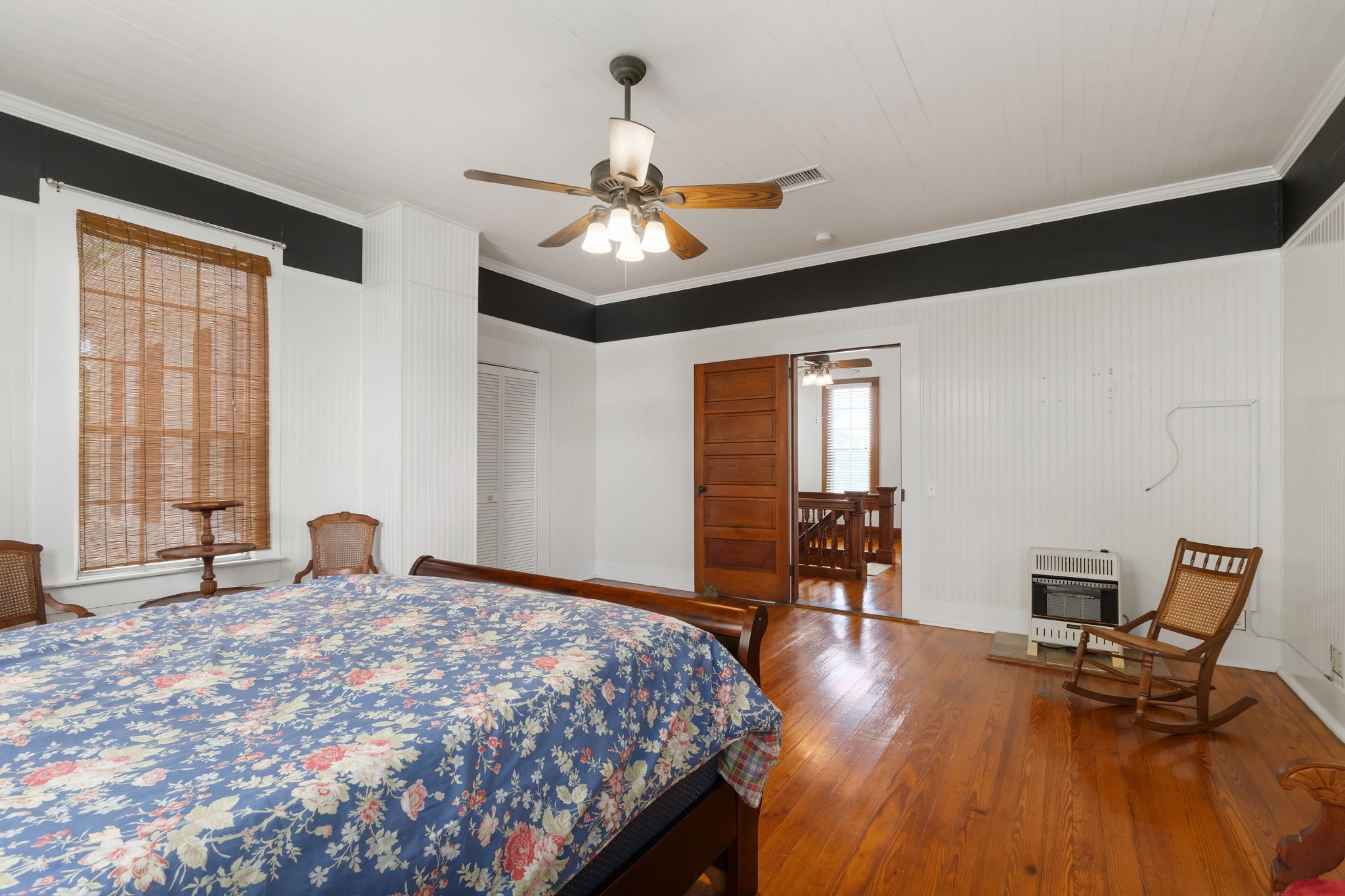 515 Wolf Street Schulenburg, TX 78956 - Photo 25 of 39 a bedroom with a bed and a large window