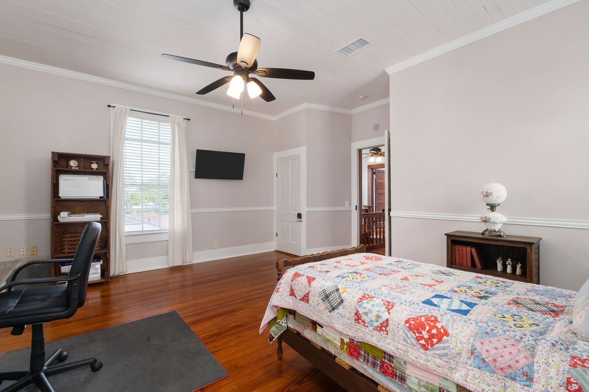 515 Wolf Street Schulenburg, TX 78956 - Photo 31 of 39 a bedroom with a bed and a flat screen tv