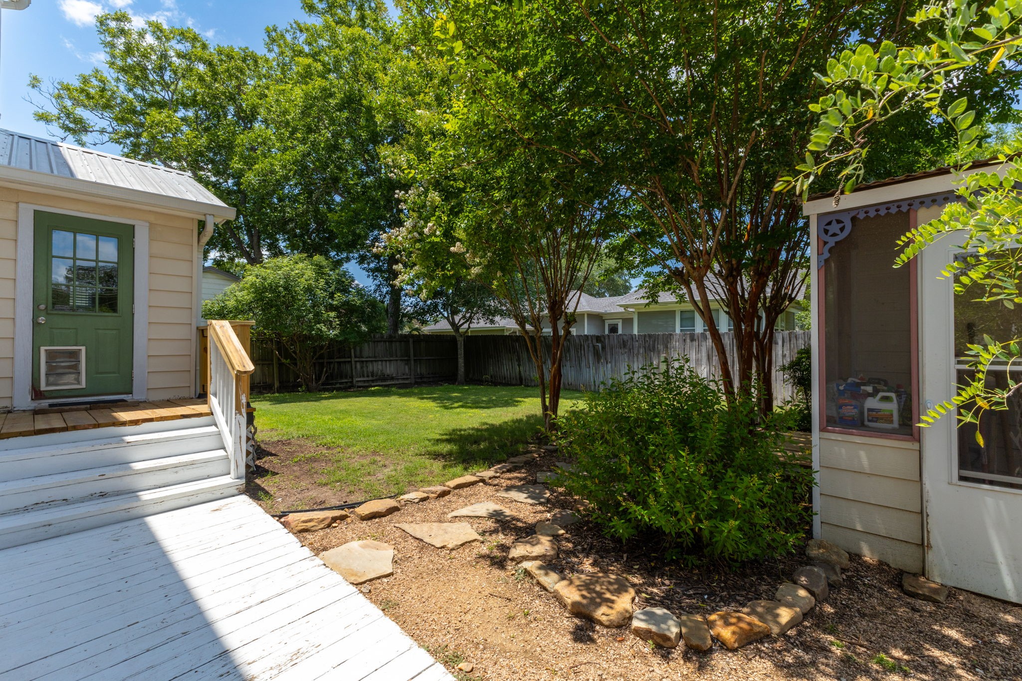 515 Wolf Street Schulenburg, TX 78956 - Photo 34 of 39 a front view of a house with garden