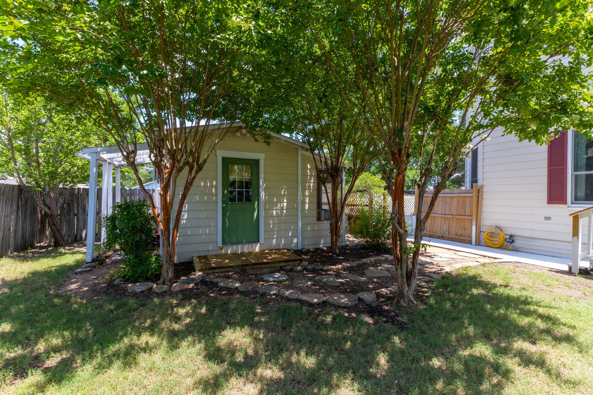 515 Wolf Street Schulenburg, TX 78956 - Photo 38 of 39 a front view of a house with garden