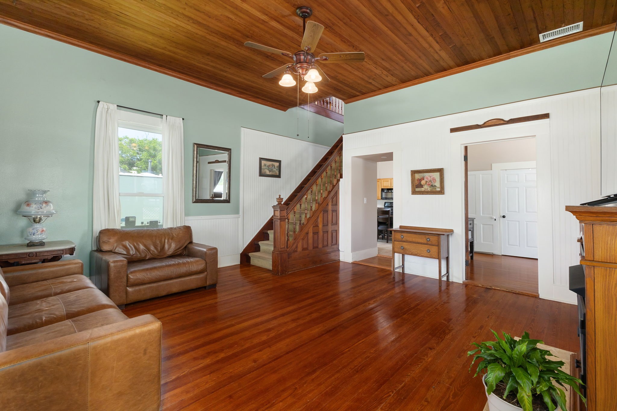 515 Wolf Street Schulenburg, TX 78956 - Photo 7 of 39 a living room with furniture and a wooden floor
