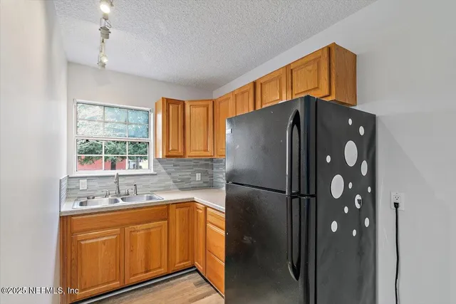 a bathroom with a sink toilet and vanity