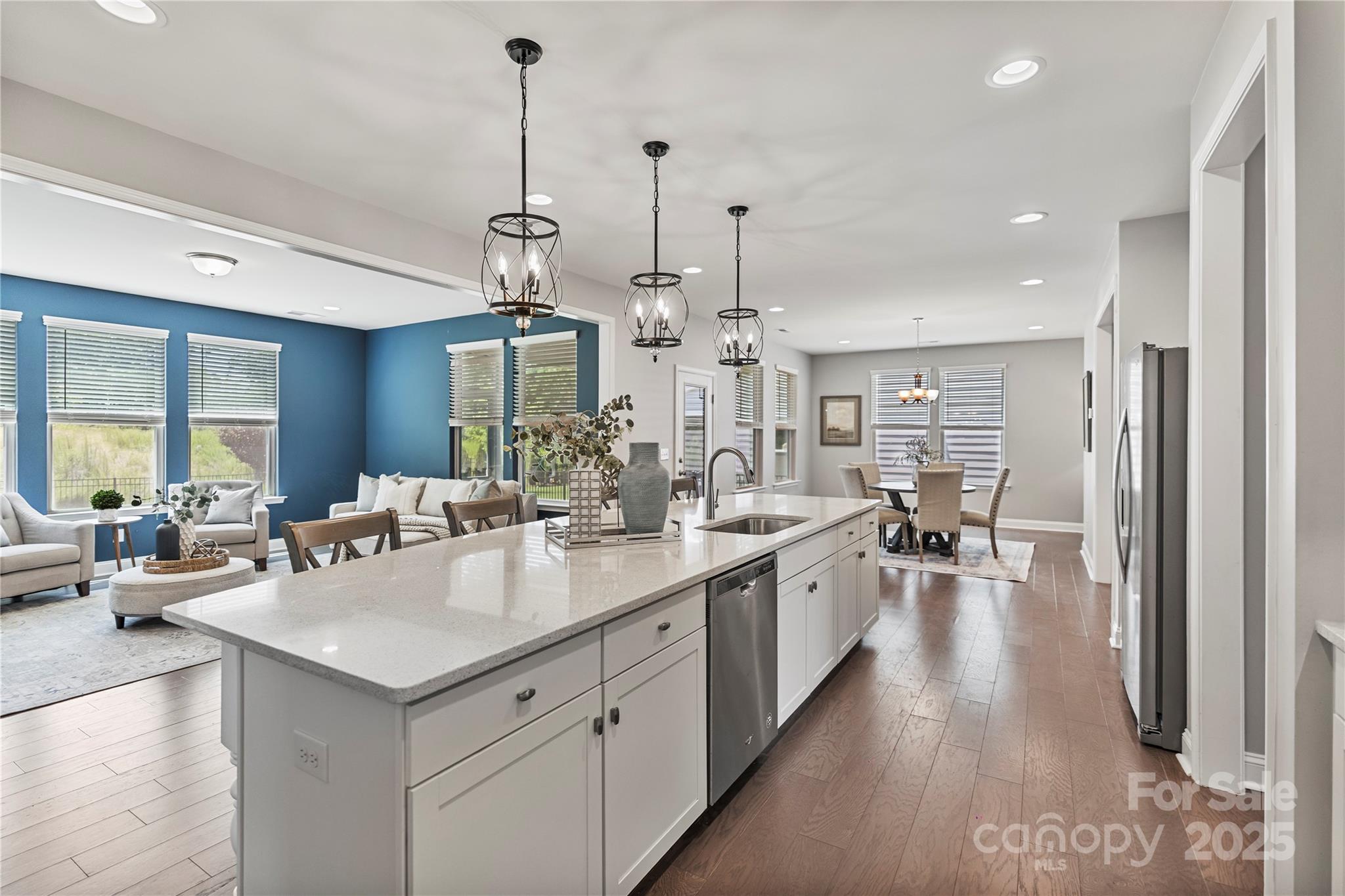 2225 Masons Bend Drive Fort Mill, SC 29708 - Photo 6 of 45 a large kitchen with kitchen island a sink appliances and a counter space