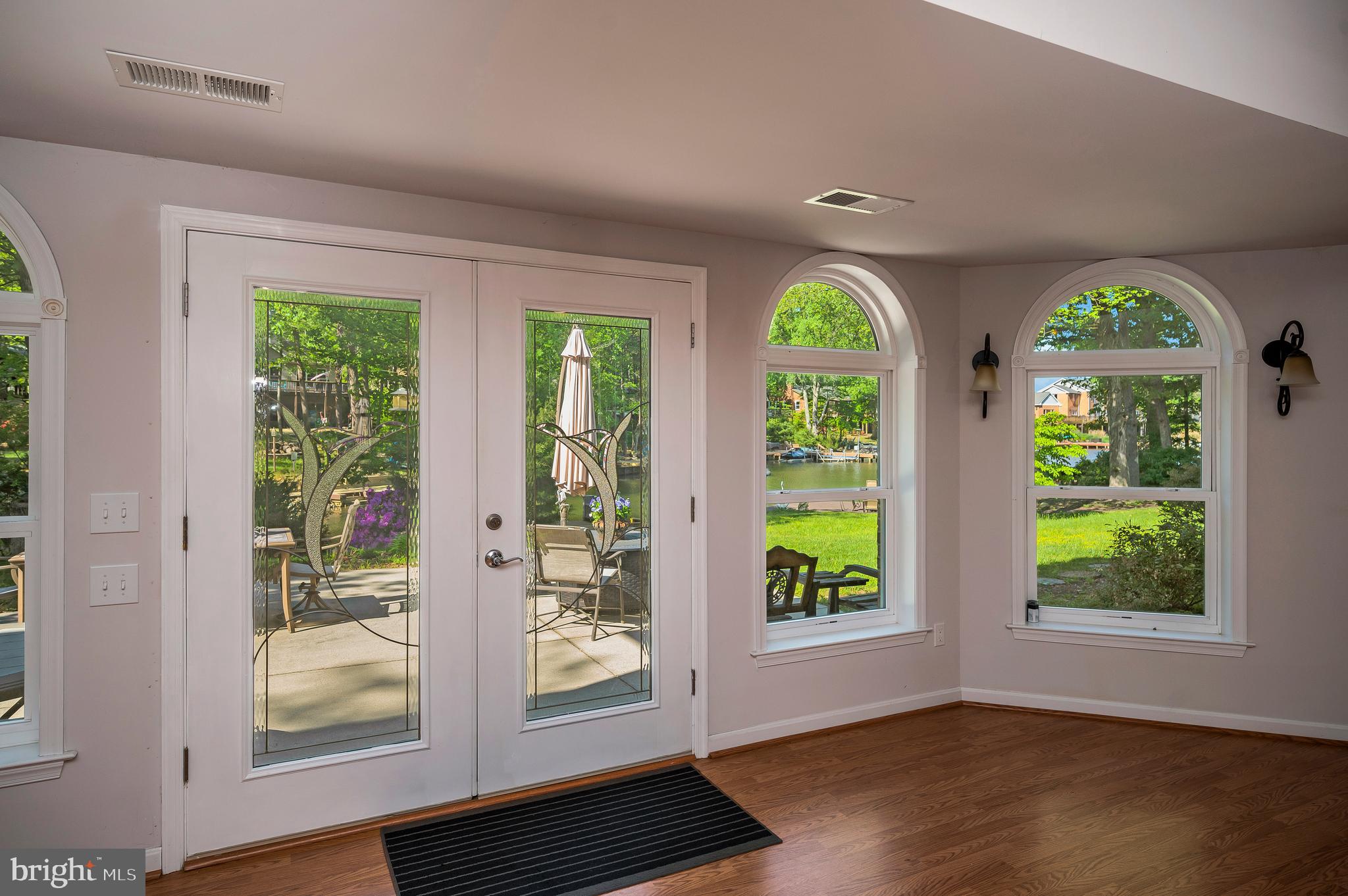 322 Birchside Circle Locust Grove, VA 22508 - Photo 42 of 77 window wall lakeside opens to patio