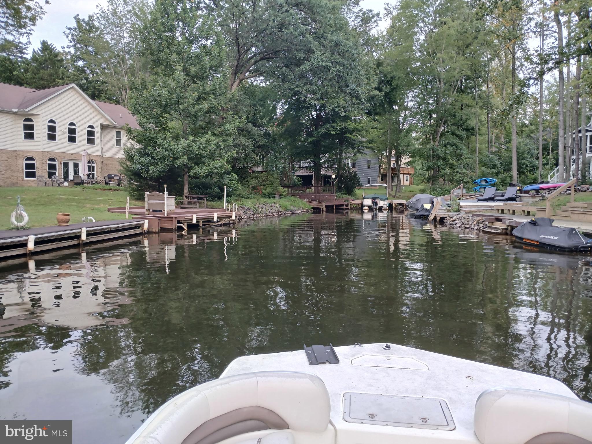 322 Birchside Circle Locust Grove, VA 22508 - Photo 59 of 77 boating into cove dock