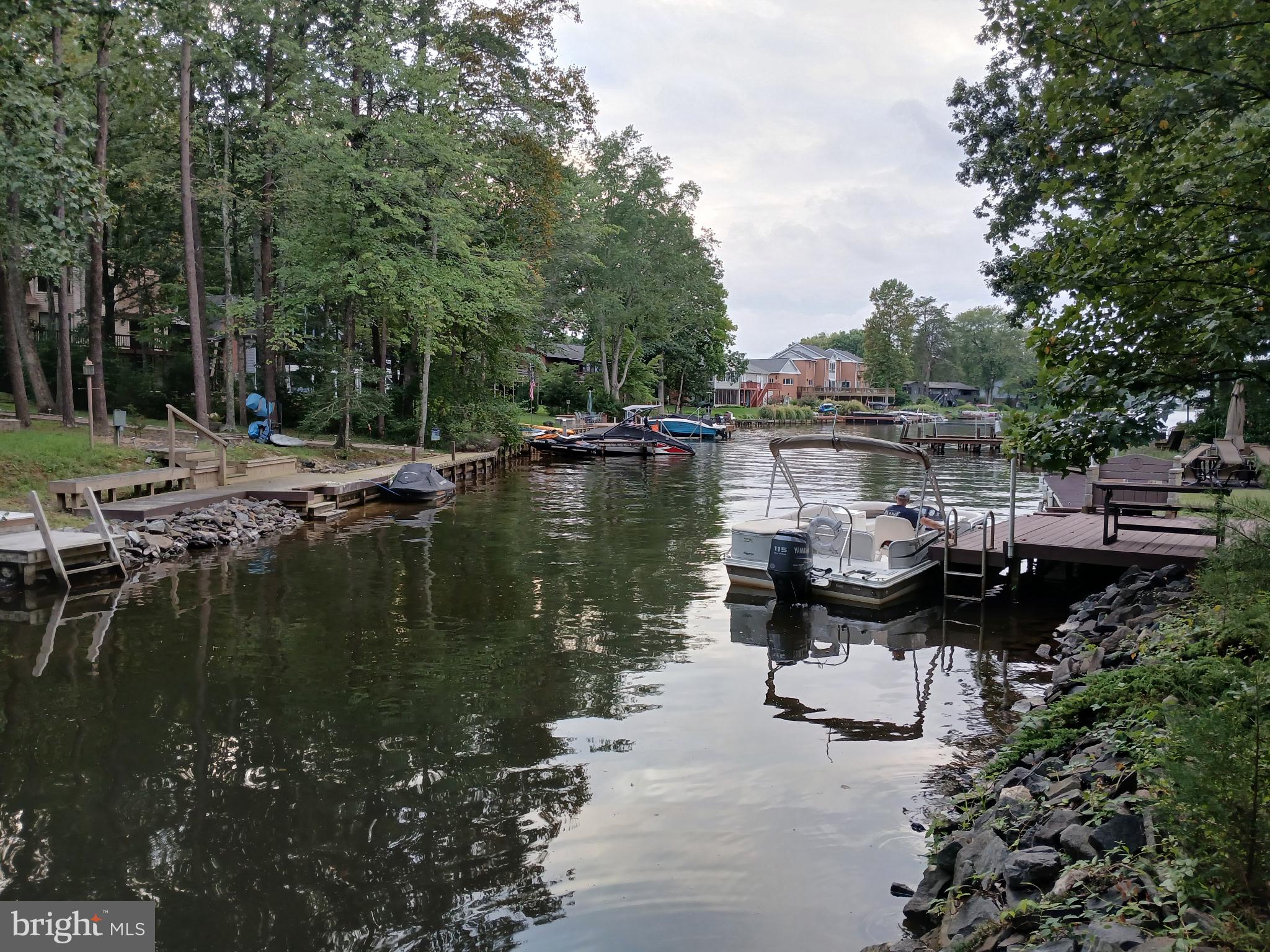 322 Birchside Circle Locust Grove, VA 22508 - Photo 62 of 77 boat docked facing out the cove
