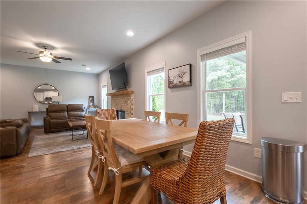 719 Fairview Road Brooks, GA 30205 - Photo 13 of 35 a view of a dining room with furniture window and wooden floor