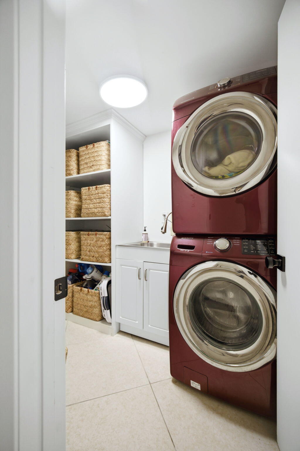 7798 La Mirada Drive Boca Raton, FL 33433 - Photo 22 of 49 Laundry room with sink