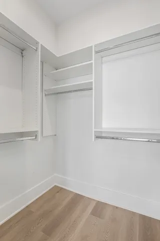 a view of an empty walk in closet