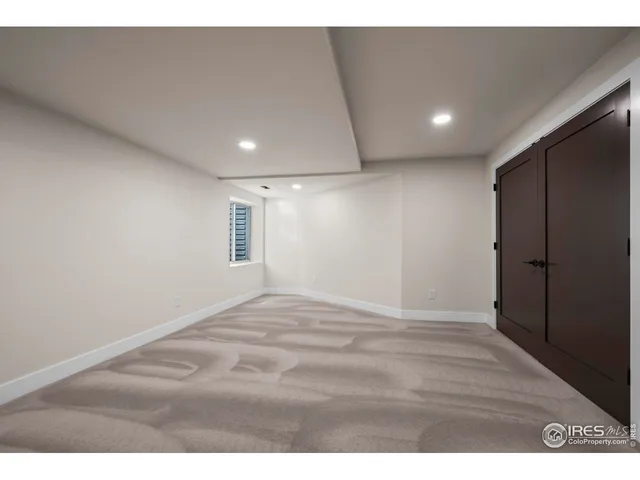 a bathroom with a sink a toilet a shower a mirror and bathtub