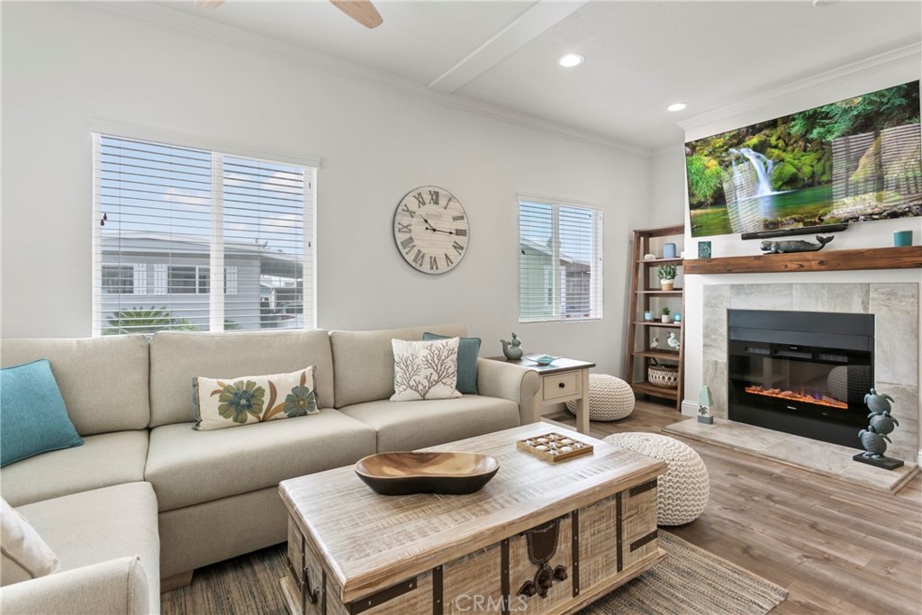 108 Bay Drive San Clemente, CA 92672 - Photo 12 of 28 a living room with furniture and a fireplace